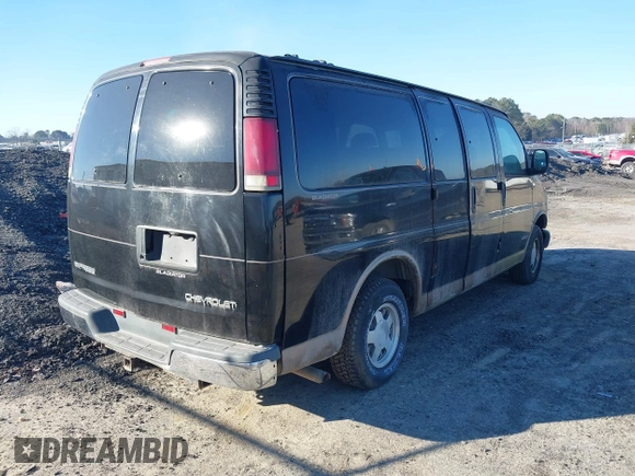 2000 Chevrolet Express Cargo Van w/YF7 with VIN 1GBFG15R6Y1173065, listed as a IAAI auction lot 41357260 with 242,540 mi miles. Bid and sale history available at carsss.com. Image 4.