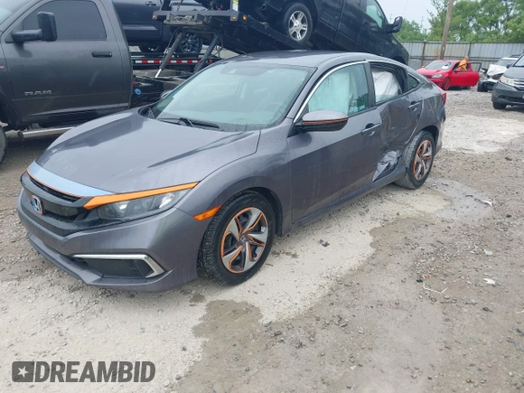 2020 Honda Civic LX z VIN 19XFC2F66LE012481, wystawiony jako IAAI lot #42297600 z przebiegiem 56 602 mil mil oraz . Historia ofert i sprzedaży dostępna na DreamBid. Obrazek 18.