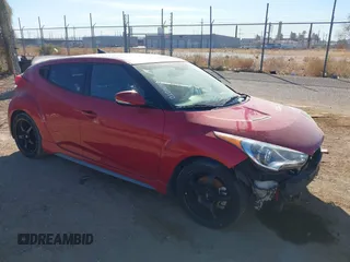 2013 Hyundai Veloster Turbo with VIN KMHTC6AEXDU107021, listed as a IAAI auction lot 41651607 with 114,704 mi miles and . Bid and sale history available at DreamBid. Image 1.