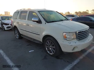 2007 Chrysler Aspen Limited with VIN 1A8HX58207F506851, listed as a IAAI auction lot 41257995 with 214,121 mi miles. Bid and sale history available at carsss.com. Image 1.