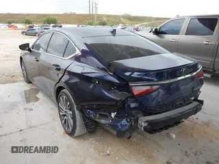 2021 Lexus ES with VIN 58ADZ1B1XMU100242, listed as a IAAI auction lot 41971747 with 27,965 mi miles. Bid and sale history available at carsss.com. Image 3.