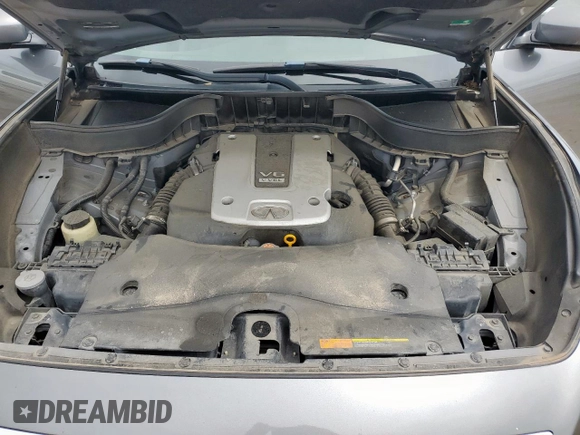 2017 Infiniti QX70 z VIN JN8CS1MU7HM141618, wystawiony jako Copart lot #59794075 z przebiegiem 114 272 mil mil oraz Szkoda całkowita • Salvage title. Historia ofert i sprzedaży dostępna na DreamBid. Obrazek 12.