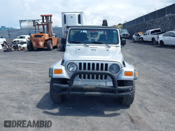 2004 Jeep Wrangler Sport with VIN 1J4FA49S04P781581, listed as a IAAI auction lot 42078693 with 111,123 mi miles and . Bid and sale history available at DreamBid. Image 12.