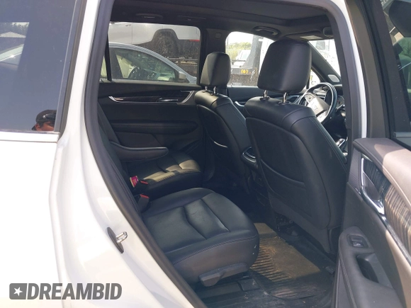 2022 Cadillac XT6 Premium Luxury with VIN 1GYKPCRS2NZ127050, listed as a IAAI auction lot 42072418 with 31,165 mi miles and . Bid and sale history available at DreamBid. Image 8.