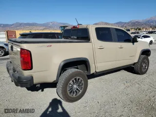 2022 Chevrolet Colorado 4WD ZR2 with VIN 1GCGTEEN4N1271054, listed as a Copart auction lot 87038104 with 13,697 mi miles and Salvage Title. Bid and sale history available at carsss.com. Image 3.