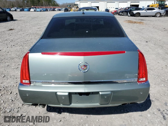 2007 Cadillac DTS Luxury I z VIN 1G6KD57Y97U131827, wystawiony jako Copart lot #47862515 z przebiegiem 103 713 mil mil oraz Szkoda całkowita • Salvage title. Historia ofert i sprzedaży dostępna na DreamBid. Obrazek 6.
