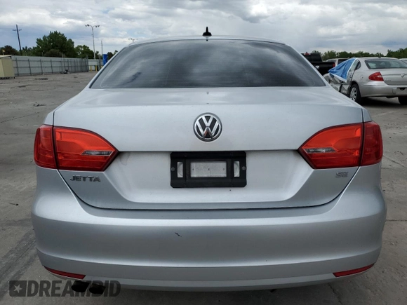 2014 Volkswagen Jetta SE with VIN 3VWD17AJ0EM314456, listed as a Copart auction lot 57380645 with 148,801 mi miles and Salvage title. Bid and sale history available at DreamBid. Image 6.