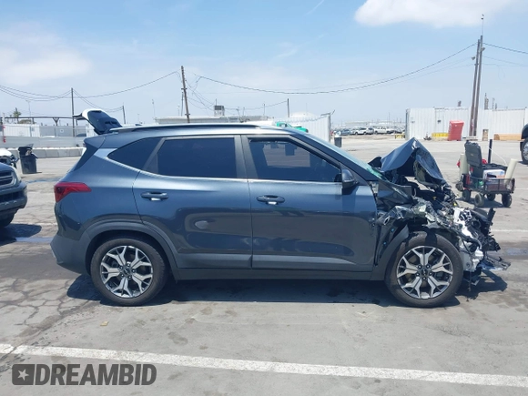 2022 Kia Seltos EX z VIN KNDERCAA2N7246714, wystawiony jako IAAI lot #42282653 z przebiegiem 51 650 mil mil oraz . Historia ofert i sprzedaży dostępna na DreamBid. Obrazek 13.