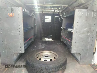 2010 Ford Econoline Cargo Commercial with VIN 1FTNE2EW0ADA98103, listed as a IAAI auction lot 41735290 with 143,717 mi miles and . Bid and sale history available at DreamBid. Image 8.