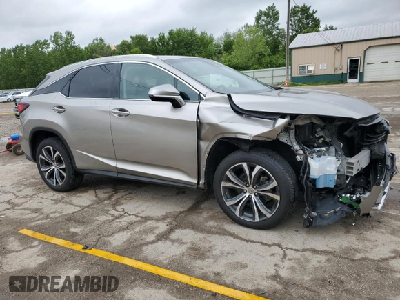 2017 Lexus RX 350 z VIN 2T2BZMCA8HC055917, wystawiony jako Copart lot #57641945 z przebiegiem 114 036 mil mil oraz Szkoda całkowita • Salvage title. Historia ofert i sprzedaży dostępna na DreamBid. Obrazek 4.