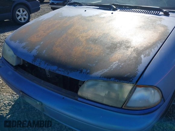 1995 Ford Aspire z VIN KNJLT06H7S6105536, wystawiony jako IAAI lot #41860978 z przebiegiem 66 132 mil mil oraz . Historia ofert i sprzedaży dostępna na DreamBid. Obrazek 6.