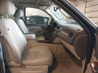 2012 Chevrolet Tahoe LTZ with VIN 1GNSKCE02CR297261, listed as a IAAI auction lot 40255137 with 283,110 mi miles and . Bid and sale history available at DreamBid. Image 5.