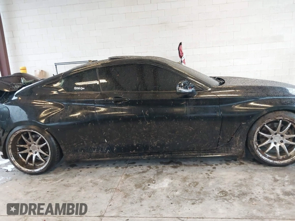 2017 Infiniti Q60 Sport with VIN JN1EV7EK5HM360687, listed as a IAAI auction lot 41243501 with 103,027 mi miles and . Bid and sale history available at DreamBid. Image 13.