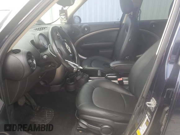 2013 MINI Countryman with VIN WMWZB3C59DWM08636, listed as a Copart auction lot 77442344 with 103,118 mi miles and Clean title. Bid and sale history available at DreamBid. Image 7.