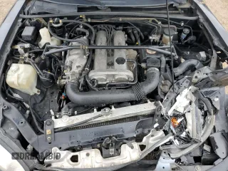 1999 Mazda MX-5 Miata with VIN JM1NB3531X0102616, listed as a Copart auction lot 59779415 with 194,494 mi miles and Salvage title. Bid and sale history available at DreamBid. Image 11.