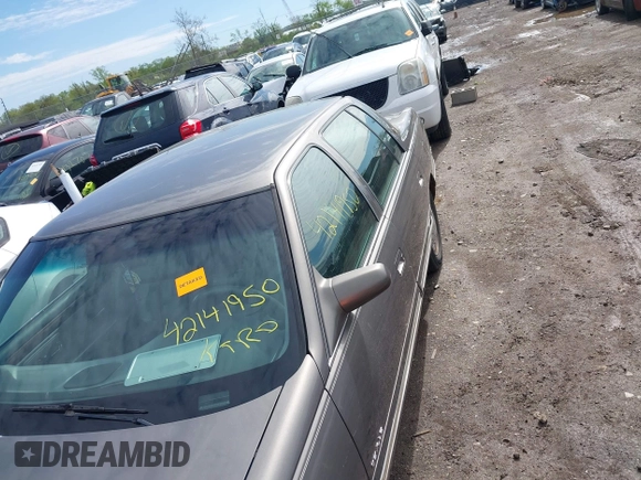 1999 Cadillac DeVille DHS z VIN 1G6KE54Y2XU752599, wystawiony jako IAAI lot #42141950 z przebiegiem 135 999 mil mil oraz . Historia ofert i sprzedaży dostępna na DreamBid. Obrazek 6.