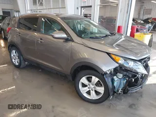 2012 Kia Sportage LX with VIN KNDPB3A23C7317650, listed as a IAAI auction lot 41631193 with 96,433 mi miles. Bid and sale history available at carsss.com. Image 1.
