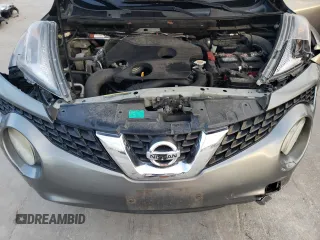 2015 Nissan Juke SL z VIN JN8AF5MR0FT502205, wystawiony jako Copart lot #80683154 z przebiegiem 131 876 mil mil oraz Szkoda całkowita • Salvage title. Historia ofert i sprzedaży dostępna na DreamBid. Obrazek 11.