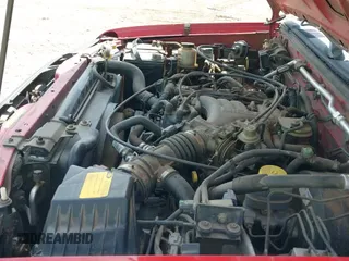 2000 Nissan Frontier XE with VIN 1N6ED27T5YC355209, listed as a IAAI auction lot 42397674 with 198,278 mi miles and . Bid and sale history available at DreamBid. Image 12.