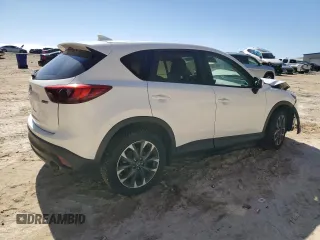 2016 Mazda CX-5 Grand Touring with VIN JM3KE4DY6G0857197, listed as a Copart auction lot 44500955 with 76,088 mi miles and Salvage Title. Bid and sale history available at DreamBid. Image 3.