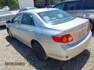2009 Toyota Corolla with VIN JTDBL40E99J010861, listed as a IAAI auction lot 42143607 with 333,838 mi miles and . Bid and sale history available at DreamBid. Image 3.