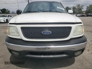 2002 Ford F-150 XLT with VIN 1FTRW07L52KA04929, listed as a Copart auction lot 54491815 with 169,132 mi miles and Salvage Title. Bid and sale history available at carsss.com. Image 5.