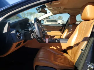 2013 Jaguar XJ with VIN SAJWA2G16DLV50973, listed as a Copart auction lot 82555074 with 148,956 mi miles and Salvage Title. Bid and sale history available at carsss.com. Image 7.