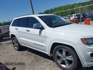 2015 Jeep Grand Cherokee Overland with VIN 1C4RJECG6FC707458, listed as a IAAI auction lot 41996350 with 128,307 mi miles and . Bid and sale history available at DreamBid. Image 13.