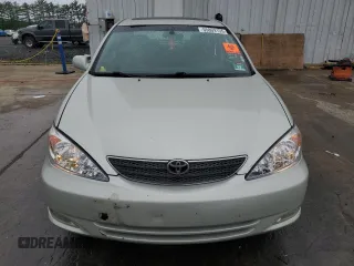 2004 Toyota Camry LE z VIN JTDBE32K940297754, wystawiony jako Copart lot #55809155 z przebiegiem 232 092 mil mil oraz Szkoda całkowita • Salvage title. Historia ofert i sprzedaży dostępna na DreamBid. Obrazek 5.