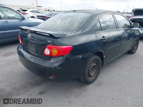 2009 Toyota Corolla with VIN 1NXBU40E59Z093650, listed as a IAAI auction lot 42121575 with 166,631 mi miles. Bid and sale history available at carsss.com. Image 4.
