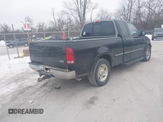 1998 Ford F-150 with VIN 1FTZX1763WNB98605, listed as a IAAI auction lot 41396443 with 116,084 mi miles and . Bid and sale history available at DreamBid. Image 4.
