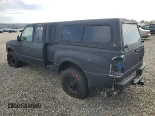 1999 Ford Ranger XL with VIN 1FTZR15V1XPB88455, listed as a Copart auction lot 61976915 with 117,711 mi miles and Salvage title. Bid and sale history available at DreamBid. Image 2.