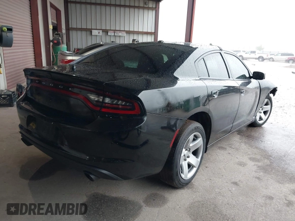 2021 Dodge Charger Police with VIN 2C3CDXAT5MH663136, listed as a IAAI auction lot 40348927 with 66,501 mi miles and . Bid and sale history available at DreamBid. Image 4.