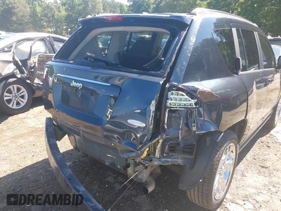 2015 Jeep Compass Latitude with VIN 1C4NJCEBXFD179373, listed as a IAAI auction lot 39380614 with 104,832 mi miles. Bid and sale history available at carsss.com. Image 6.