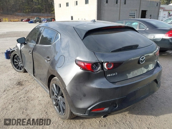 2021 Mazda 3 Premium with VIN JM1BPAML2M1310374, listed as a IAAI auction lot 41190608 with 97,648 mi miles and . Bid and sale history available at DreamBid. Image 3.