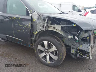 2021 Chevrolet Traverse LT z VIN 1GNEVHKW2MJ195002, wystawiony jako IAAI lot #42314214 z przebiegiem 50 877 mil mil oraz . Historia ofert i sprzedaży dostępna na DreamBid. Obrazek 17.