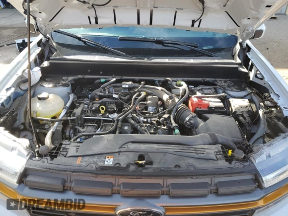 2023 Ford Maverick z VIN 3FTTW8G9XPRA99922, wystawiony jako Copart lot #89200195 z przebiegiem 7 482 mil mil oraz Szkoda całkowita • Salvage title. Historia ofert i sprzedaży dostępna na DreamBid. Obrazek 11.