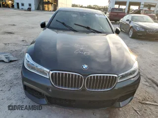 2018 BMW 7 Series 750i with VIN WBA7F0C5XJGM22674, listed as a Copart auction lot 74833524 with 0 mi miles and Salvage Title. Bid and sale history available at carsss.com. Image 5.