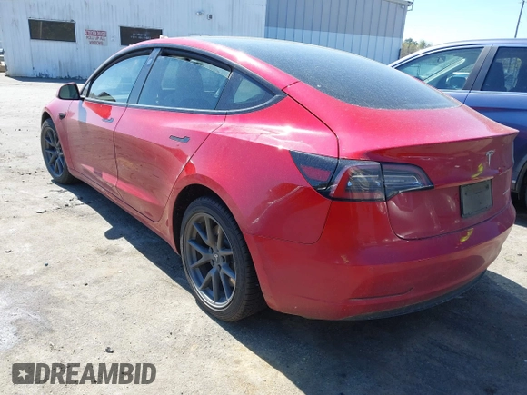 2022 Tesla Model 3 Long Range with VIN 5YJ3E1EB1NF272452, listed as a IAAI auction lot 41897358 with 78,458 mi miles and . Bid and sale history available at DreamBid. Image 3.