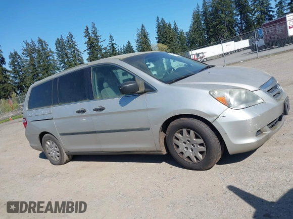 2006 Honda Odyssey LX with VIN 5FNRL38236B127129, listed as a IAAI auction lot 42041994 with 282,313 mi miles. Bid and sale history available at carsss.com. Image 13.