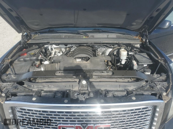 2015 GMC Yukon XL Denali with VIN 1GKS2JKJXFR527843, listed as a Copart auction lot 54159785 with 128,603 mi miles and Clean Title. Bid and sale history available at carsss.com. Image 13.