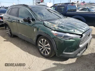 2023 Toyota Corolla Cross XLE z VIN 7MUDAABG2PV047865, wystawiony jako Copart lot #52755985 z przebiegiem 23 787 mil mil oraz Szkoda całkowita • Salvage title. Historia ofert i sprzedaży dostępna na DreamBid. Obrazek 4.