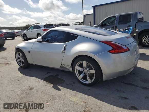 2010 Nissan 370Z Touring with VIN JN1AZ4EH2AM506507, listed as a Copart auction lot 70469504 with 115,594 mi miles and Salvage Title. Bid and sale history available at carsss.com. Image 2.