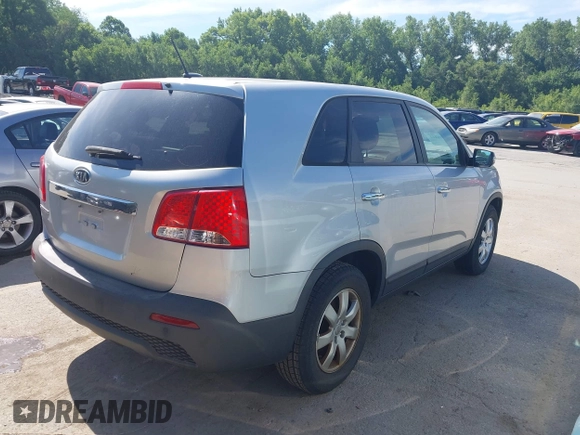 2013 Kia Sorento LX with VIN 5XYKT3A13DG408551, listed as a IAAI auction lot 42648422 with 126,985 mi miles and . Bid and sale history available at DreamBid. Image 4.