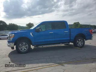 2021 Ford F-150 XL with VIN 1FTEW1EP7MFA68430, listed as a Copart auction lot 59946165 with 69,334 mi miles and Salvage title. Bid and sale history available at DreamBid. Image 1.