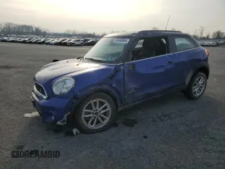 2015 MINI Paceman S with VIN WMWSS7C54FWS44644, listed as a Copart auction lot 86590934 with 156,000 mi miles and Salvage Title. Bid and sale history available at DreamBid. Image 1.