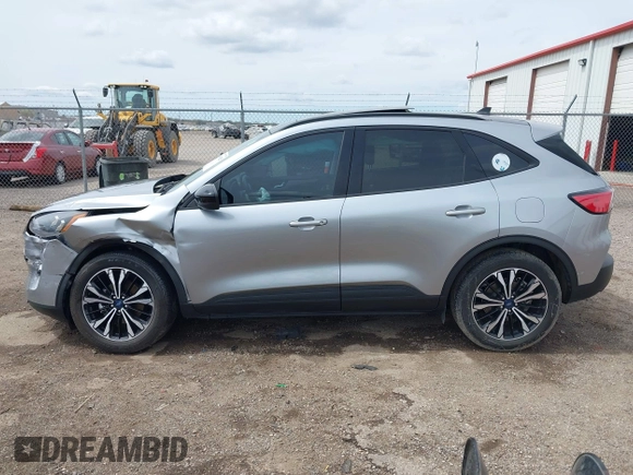 2021 Ford Escape SE Hybrid with VIN 1FMCU0BZ0MUB14085, listed as a IAAI auction lot 41942529 with 34,889 mi miles and . Bid and sale history available at DreamBid. Image 14.