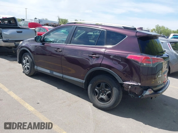 2017 Toyota RAV4 LE with VIN 2T3BFREV4HW580568, listed as a IAAI auction lot 42100704 with 157,300 mi miles and . Bid and sale history available at DreamBid. Image 3.