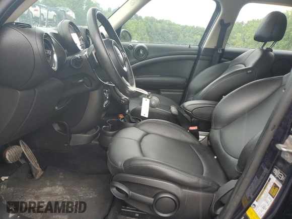 2013 MINI Countryman S ALL4 with VIN WMWZC5C56DWP30689, listed as a Copart auction lot 59680895 with 80,766 mi miles and Salvage title. Bid and sale history available at DreamBid. Image 7.