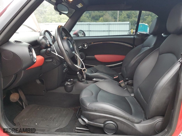 2011 MINI Cooper Convertible with VIN WMWZN3C51BTZ78331, listed as a Copart auction lot 73348304 with 94,219 mi miles and Salvage Title. Bid and sale history available at carsss.com. Image 7.